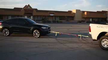 Original staged rope demonstration between vehicles