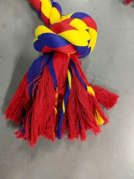 Close-up of the BLINCOO red and yellow tassel and braided knot